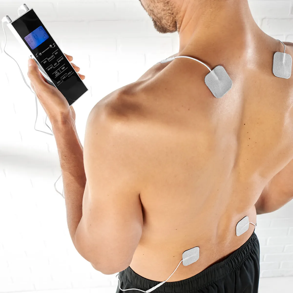 Prospera Corporation T.E.N.S. Massager with Remote Control by Sharper Image